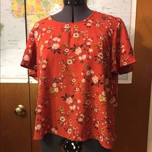 Floral orange blouse